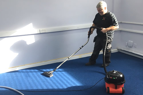 Worker cleaning floors